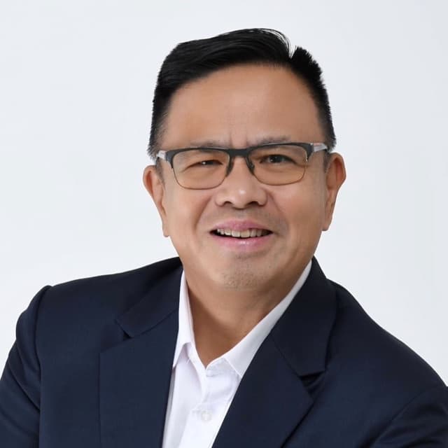 Mike Tan, licensed real estate broker