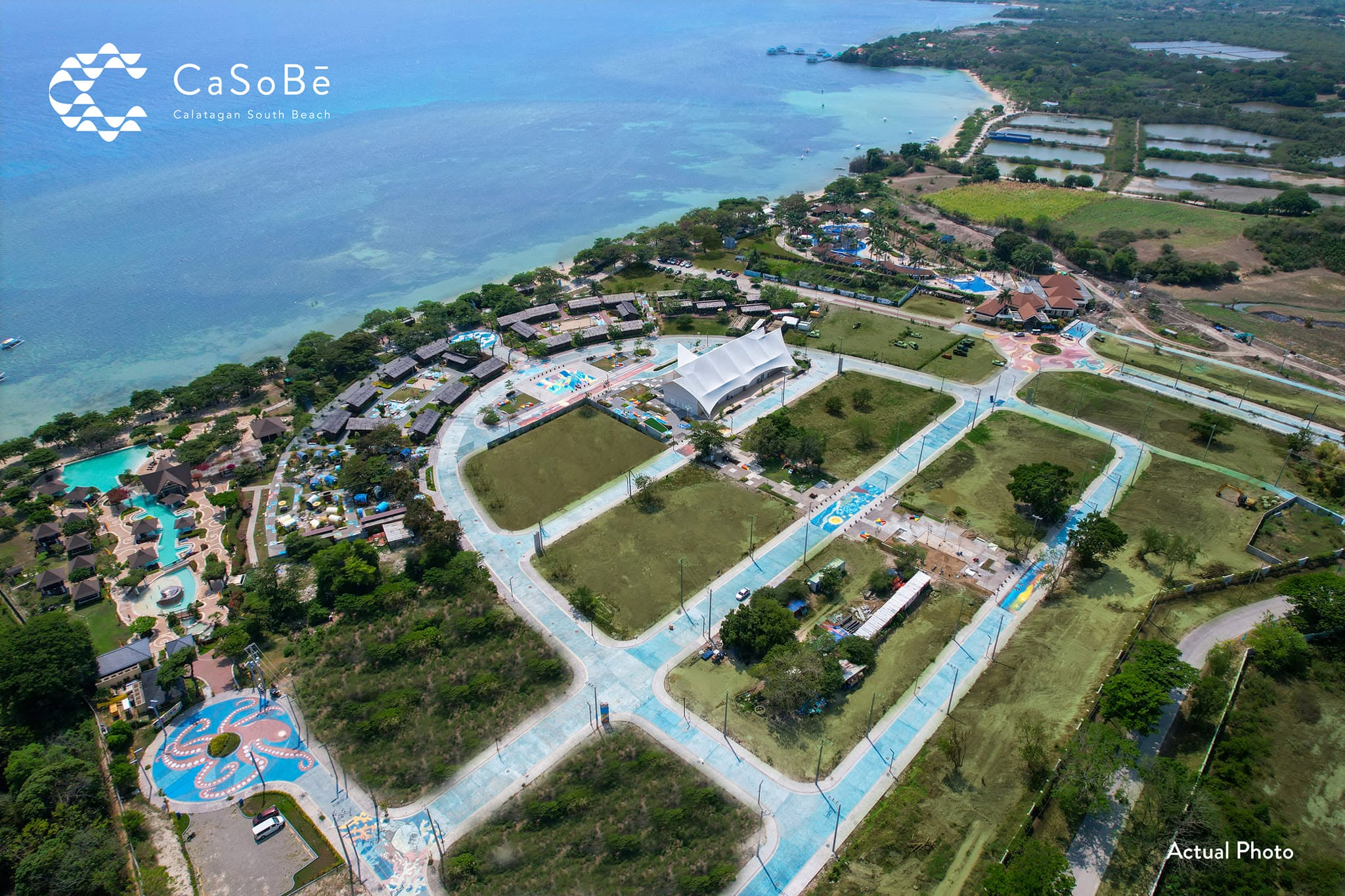 Aerial view of CaSoBe showing the lot blocks, roads, water park, and the beach